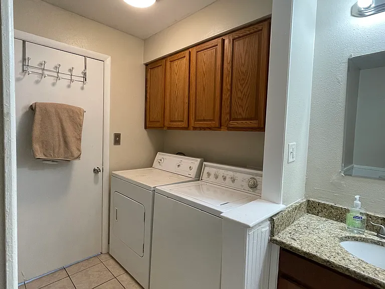 downstairs bathroom, washer and dryer come with unit