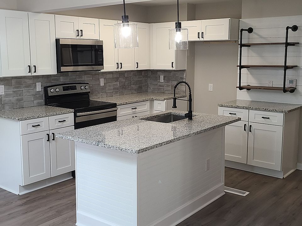 Kitchen almost done in 2023. YES fridge included