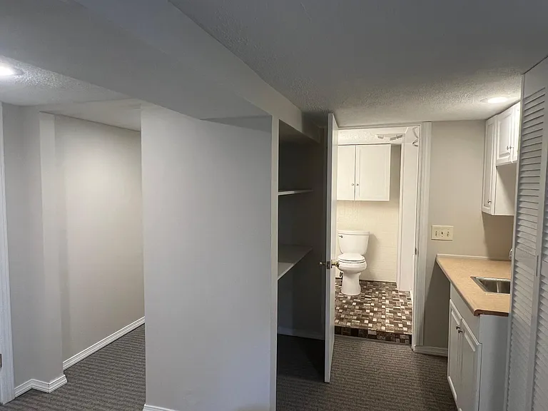 Wet bar, cabinets and open shelving