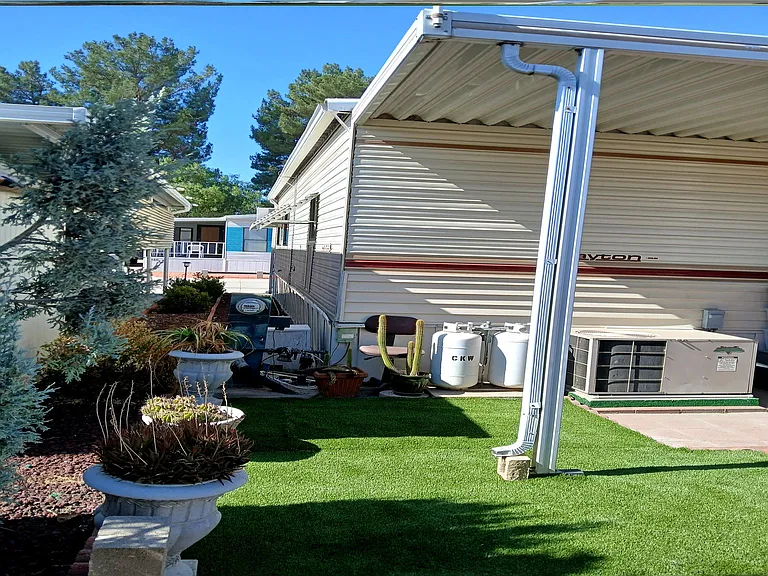 Artificial grass in back patio (maintenance free)