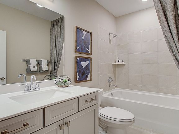 Leighton floorplan modeled at Ridgewalk Landing in Woodstock, GA.