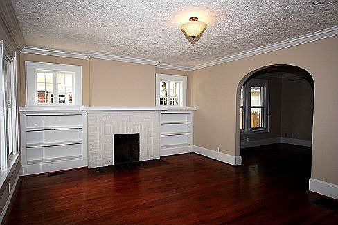 Gleaming Hardwoods and Built In Book Shelves