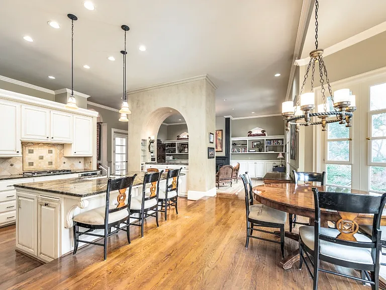 Kitchen with eat-in bar with bay window dining overlooking the Koi pond