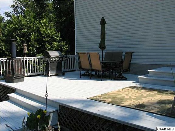 Elevated deck adjoining the pool