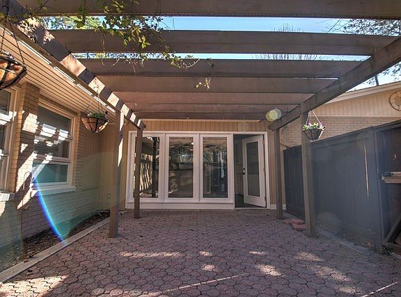 Front Fenced in Terrace w/ Brick Pavers