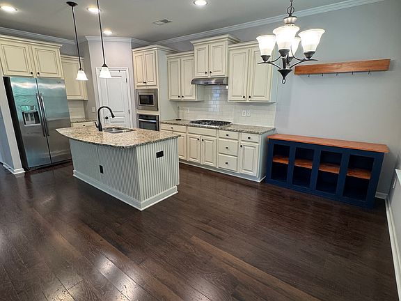 Breakfast table areas with additional cabinets as well