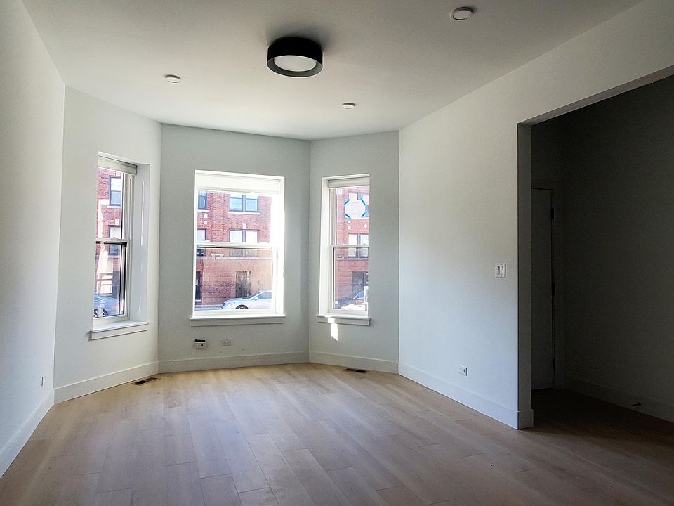 Spacious and bright living room with large windows