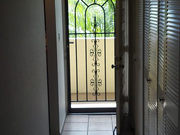 Entry hallway with washer and dryer closet