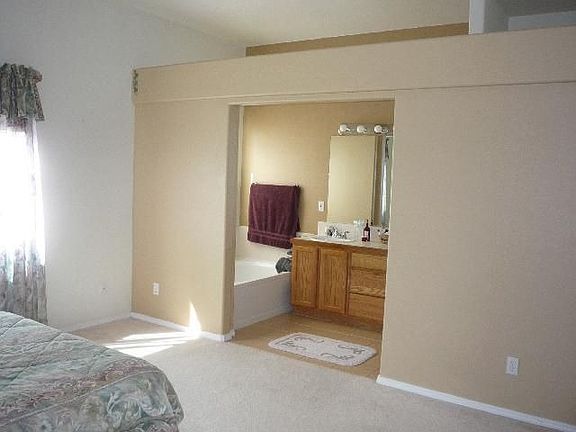 Large master bedroom with adjoining bath