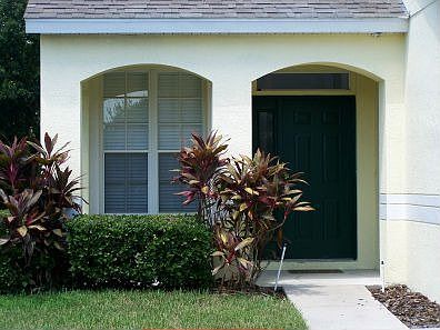 Front with arched entrance