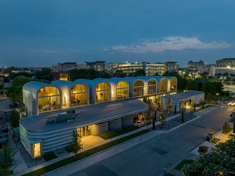 Aerial view of the complex at night.