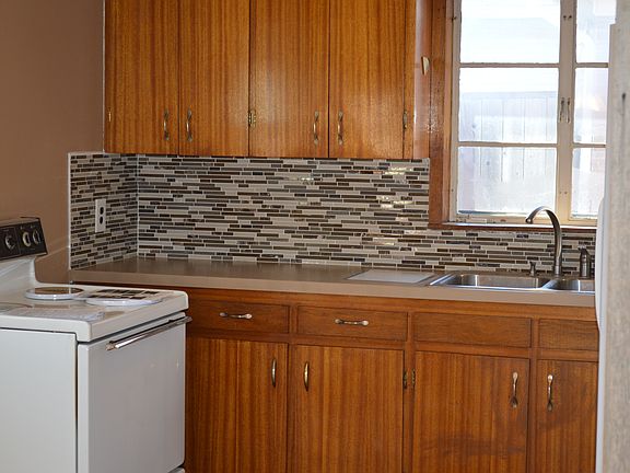 Cheery open kitchen new tile