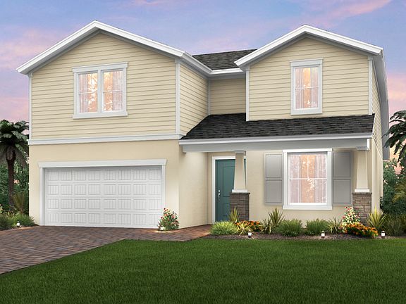 Home Exterior C2A with shingle roof and decorative stone detail