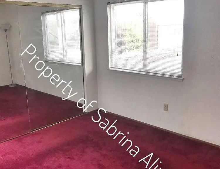 Downstairs bedroom facing water.