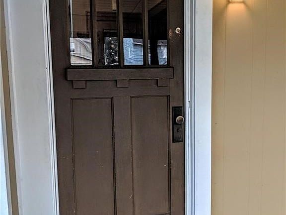 Original craftsman style door- sets the tone for what you can expect with this home!