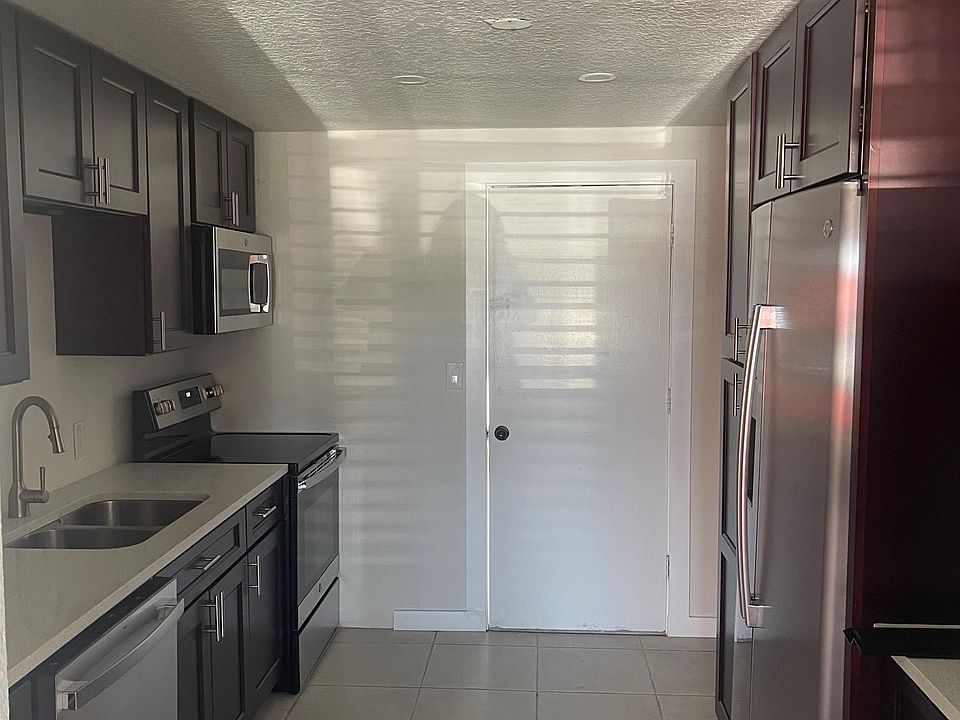 kitchen with back door entrance as well as front door