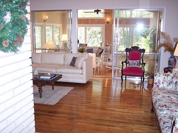View from Front Foyer Shows Gleaming Hardwood Floors