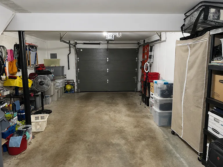 Attached garage with additional space for storage
