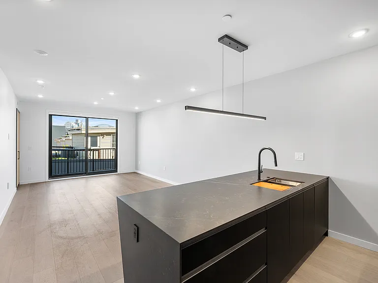 Unit X01 - Kitchen to Living Room