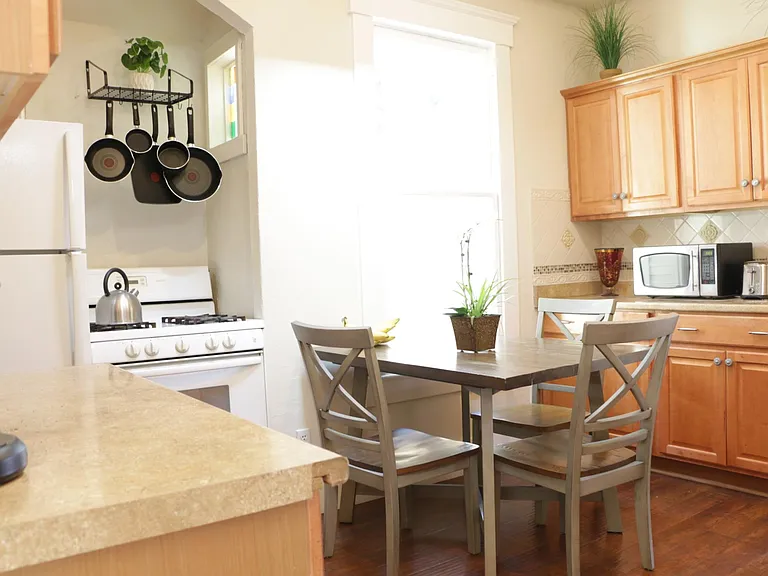 Kitchen comes with refrigerator, oven/range and dishwasher.