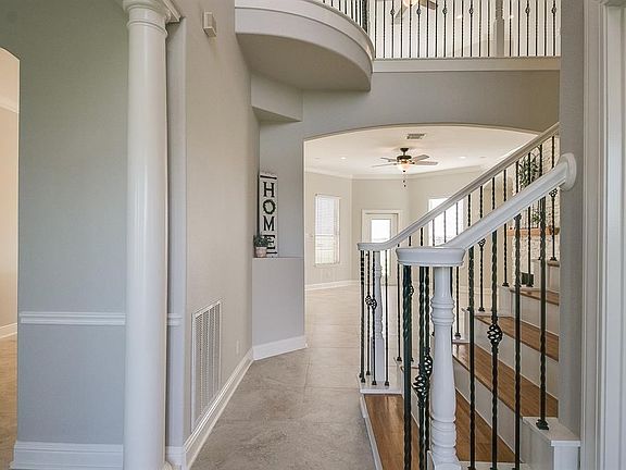 The grand 2 story entry is flanked by the study to the right and formal dining room to the left. Perhaps you don't need a study and could use this room for a wine bar or downstairs play room for littles.