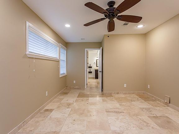 Master Bedroom with Tiled Floors and Upgraded Bathroom