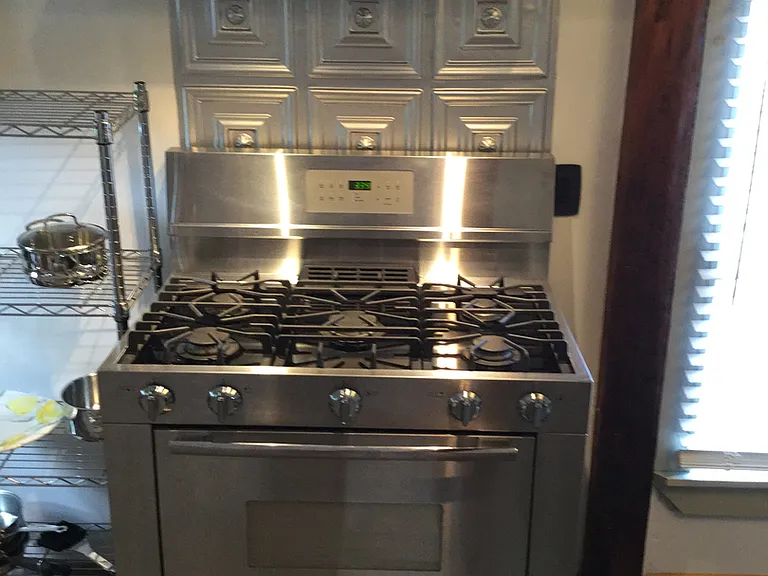 Well-equipped kitchen with premium gas range for those who enjoy cooking at home.
