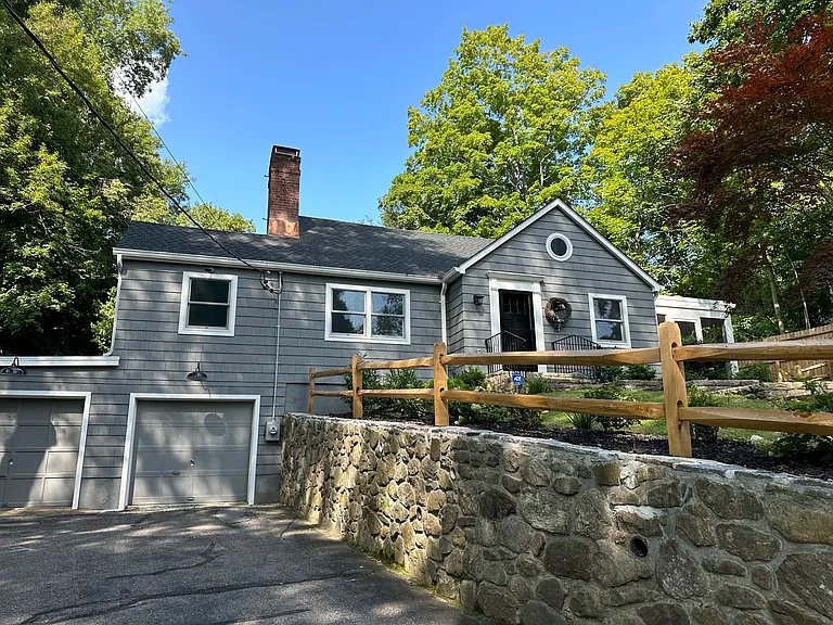 Two car garage, with direct access to basement, laundry center and storage room.