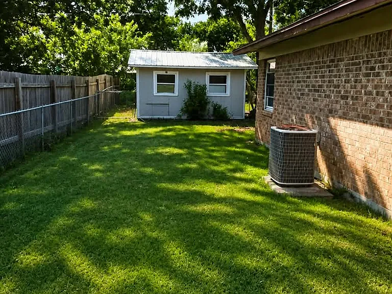 Picture of the side yard with the Large Storage Shed
