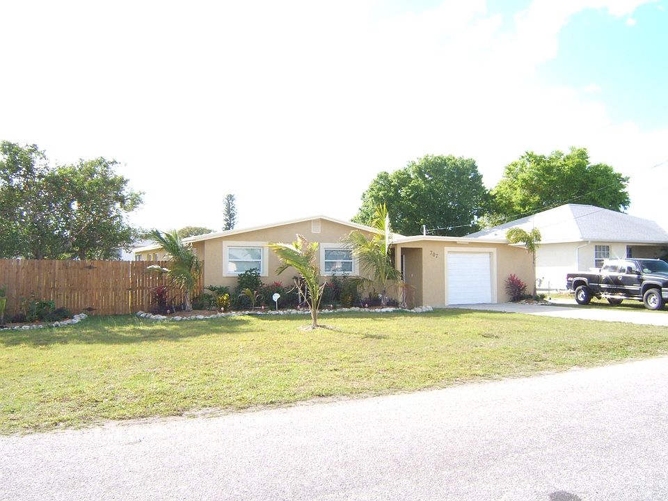 Front view of home with new landscaping