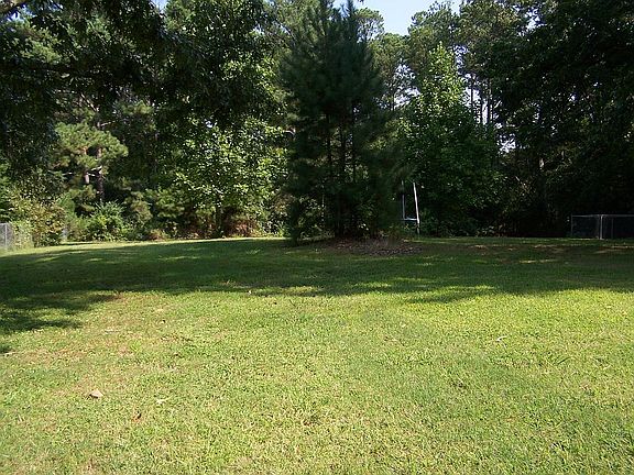 Backyard great for swing set!