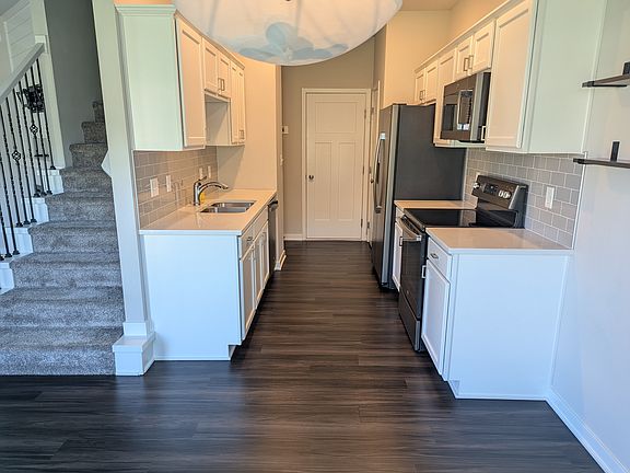 Dining room to Kitchen and Garage entryway
