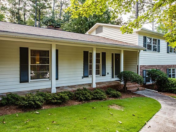 Large front porch - perfect for rocking chairs and/or a benc