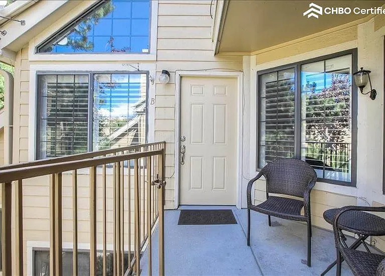 Front door with Plantation shutters surroundi
