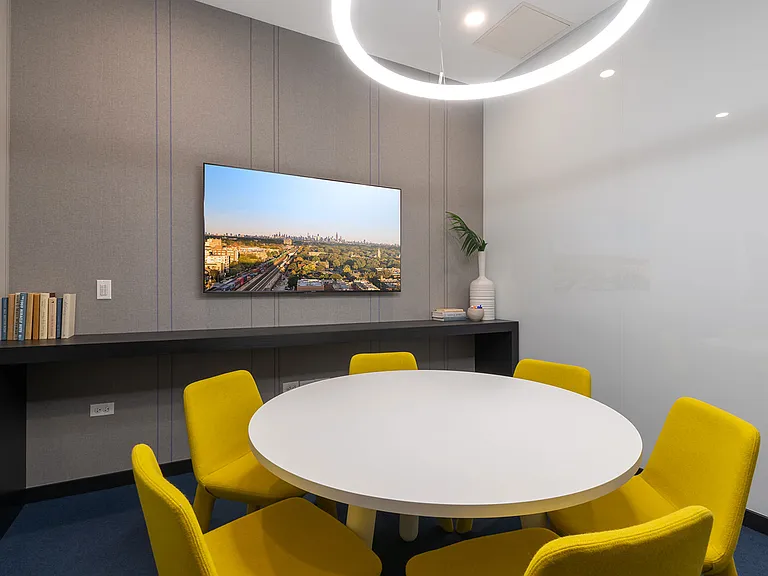 Private meeting rooms at Eleven33 offer a quiet, connected space to focus, take calls, or collaboratewithout ever leaving the building.
