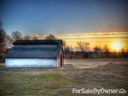 Sunrise View
						:
						Beautiful sunrises over one of the two barns in the fenced back area