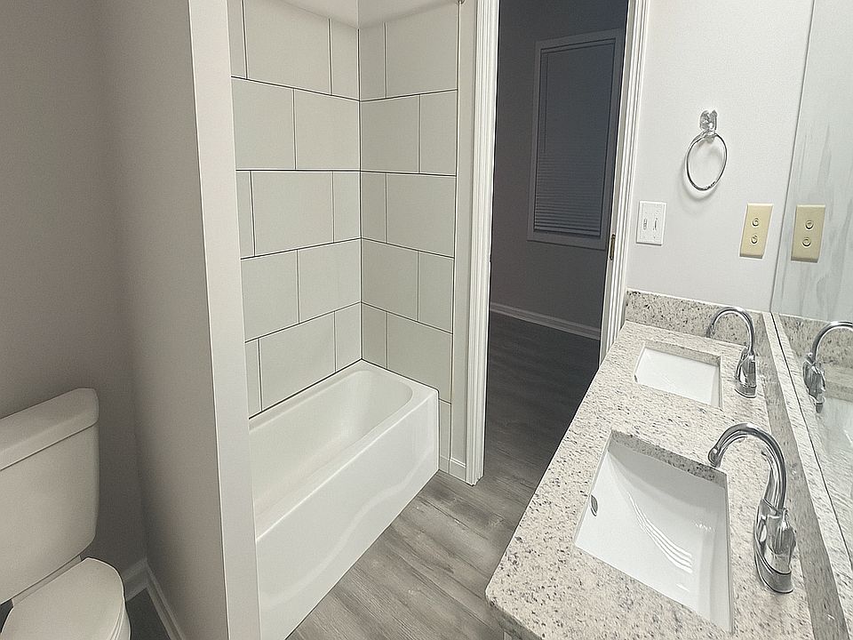 Master Bathroom with double sinks and new shower