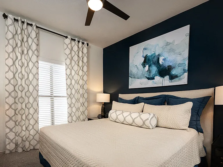 Spacious bedrooms with ceiling fans and new carpeting