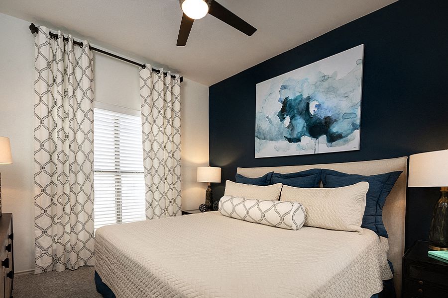 Spacious bedrooms with ceiling fans and new carpeting