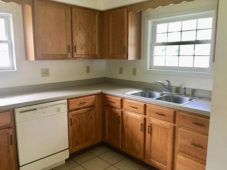 Kitchen with refrigerator, stove and dishwasher
