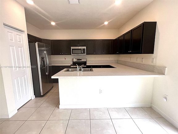 3rd image of 9333 W 32nd Ln #9333