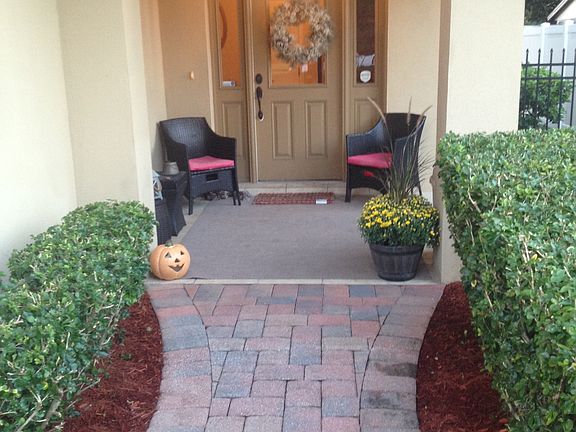Freshly sealed pavers/ mulch