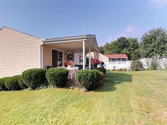 NICE LEVEL PARTIALLY FENCED CORNER LOT! LARGE PATIO TO ENTERTAIN, ENJOY MORNING COFFEE OR JUST SIT AND RELAX AND FEED THE BIRDS!