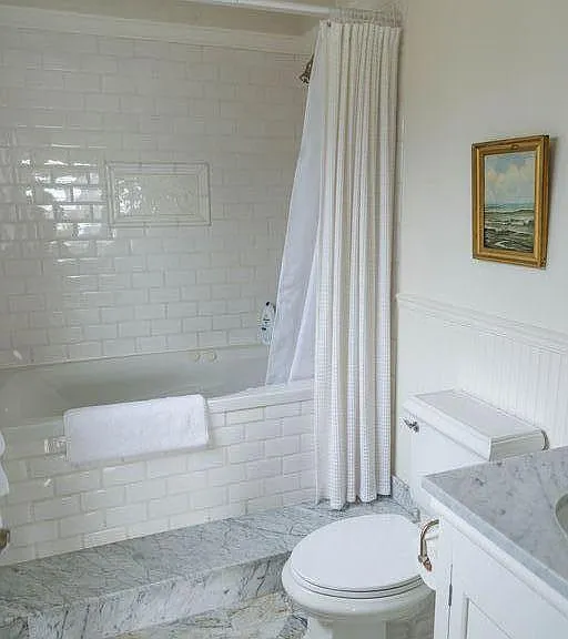 En-Suite bath with ocean views, jetted tub and heated marble floor