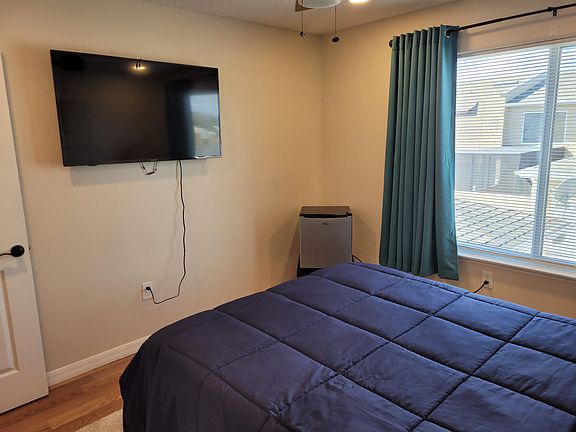 55 Inch Smart TV with Mini Fridge