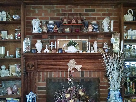 Fireplace wall with bookcase