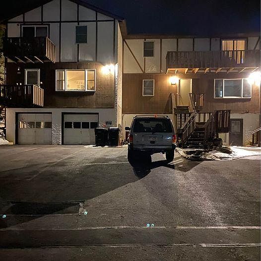 Townhouse is the lit-up window on the left side of building..