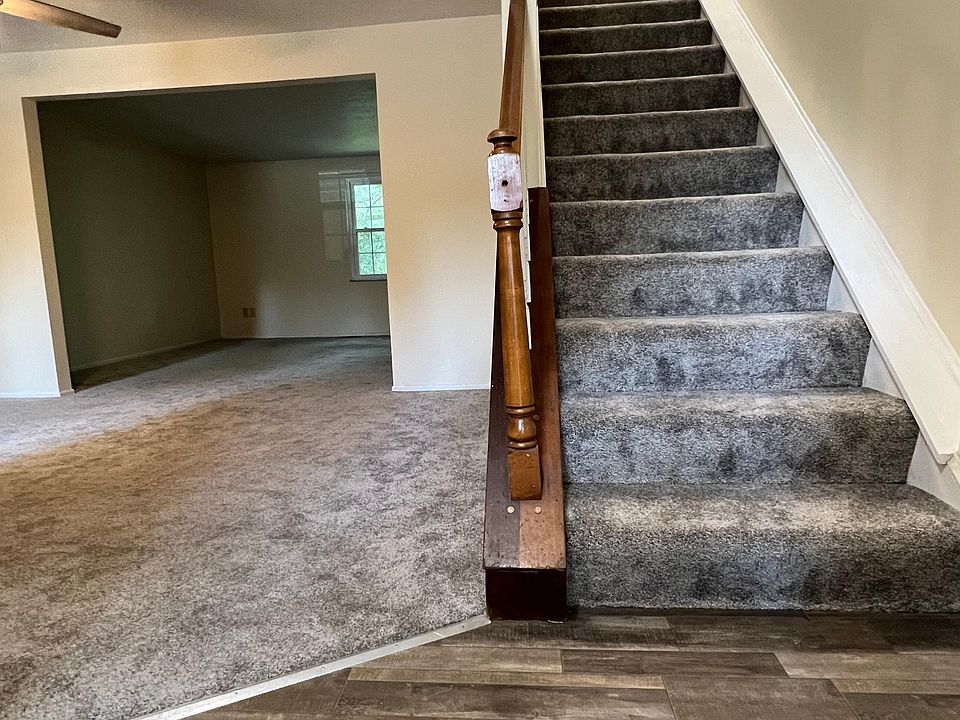 Entry way to condo, newly installed flooring throughout entire home.