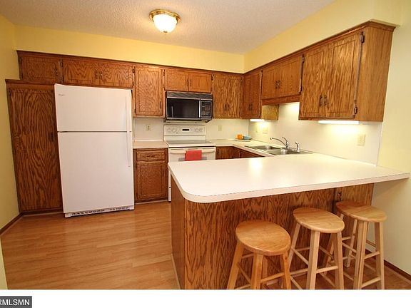 Main floor kitchen with a snack bar also includes all appliances