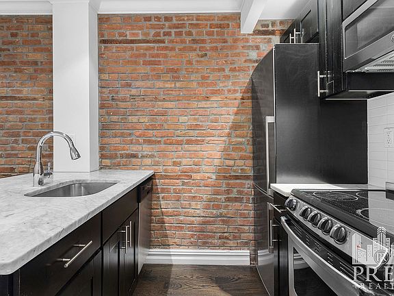 2nd image of 329 E 10th St APT 1A